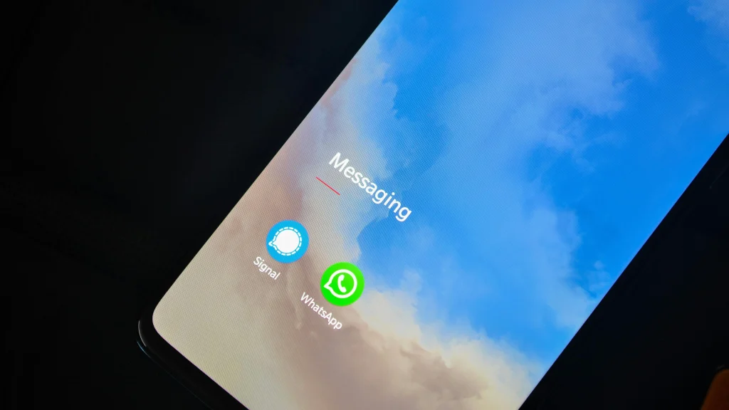 comparing phishing text messages with an official app before taking action
