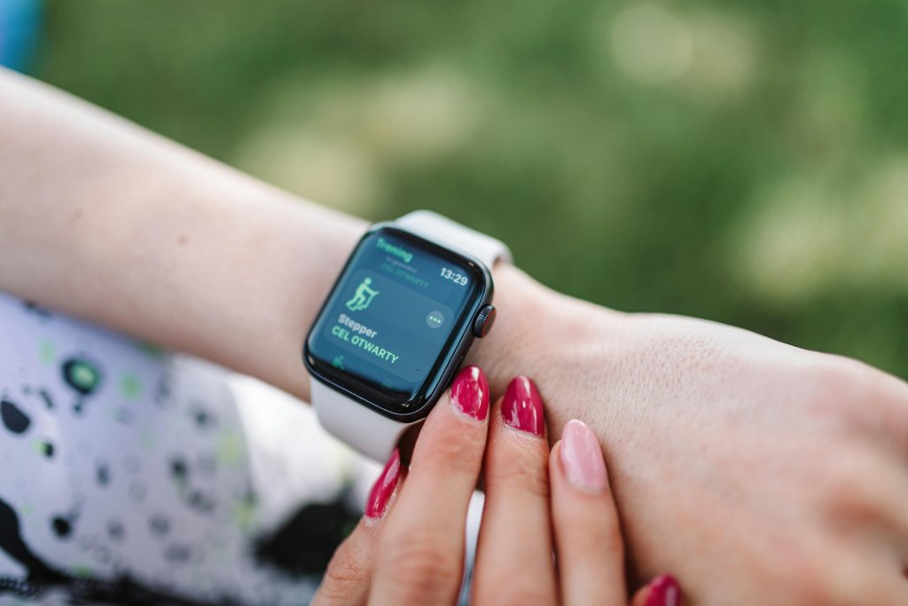 wearable technology smartwatch giving navigation prompts outdoors